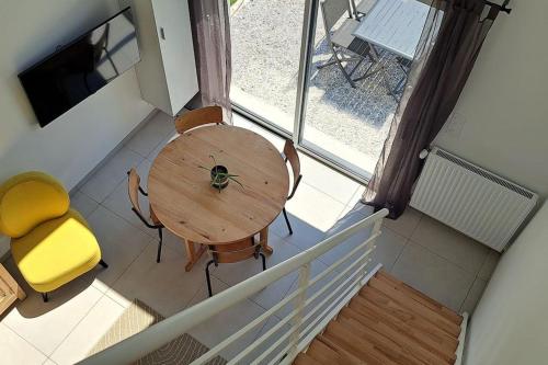 a spider sitting on a table in a room at Petite maison de bord de mer in Plobannalec-Lesconil