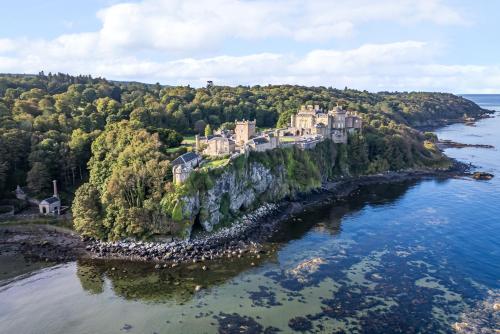 an island in the water with a castle on it at North Firbank - Culzean Castle in Maybole