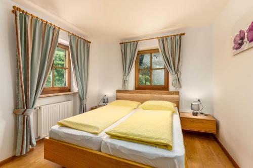Posteľ alebo postele v izbe v ubytovaní Nussbaumerhof