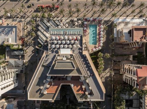 an overhead view of a building with a pool at Pure Salt Garonda - Adults Only in Playa de Palma