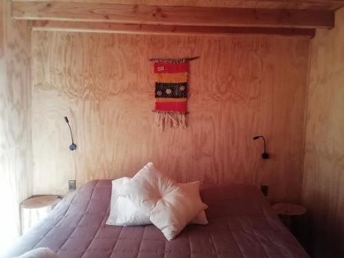 Postel nebo postele na pokoji v ubytování Cabañas Lodge Patagonia truful