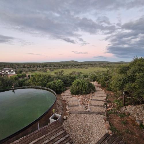 an overhead view of a pool of water in a yard at Harmony Luxury Tents & Safari in Addo