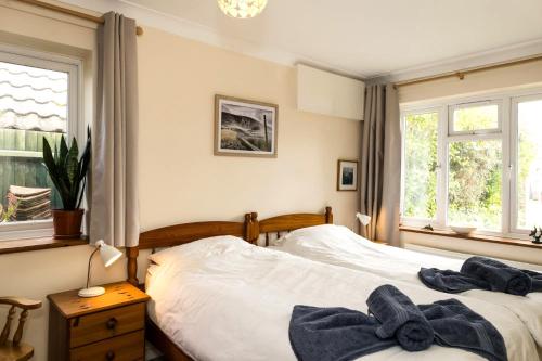 Postel nebo postele na pokoji v ubytování Coastal Hideaway in Pevensey Bay