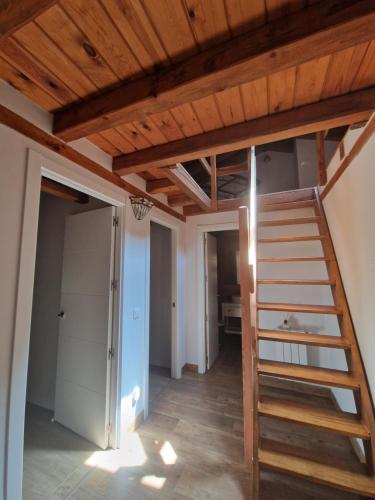 a room with a staircase and a room with a closet at Las Natillas con V in Martín Miguel