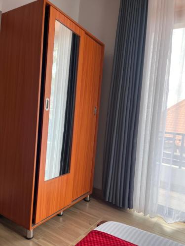 Ένα ή περισσότερα κρεβάτια σε δωμάτιο στο PECA APARTMENt