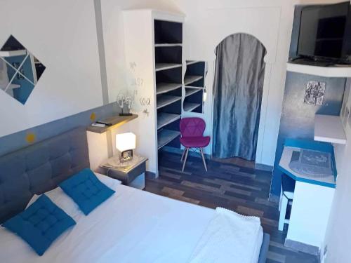 Voodi või voodid majutusasutuse hôtel Oasis toas