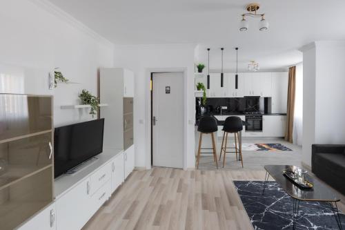 Μια τηλεόραση ή/και κέντρο ψυχαγωγίας στο All Stars Aparments