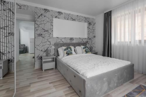 Ένα ή περισσότερα κρεβάτια σε δωμάτιο στο All Stars Aparments
