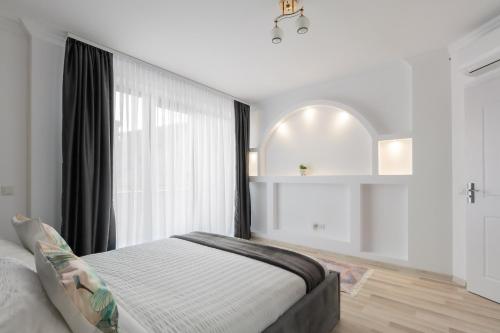 Ένα ή περισσότερα κρεβάτια σε δωμάτιο στο All Stars Aparments