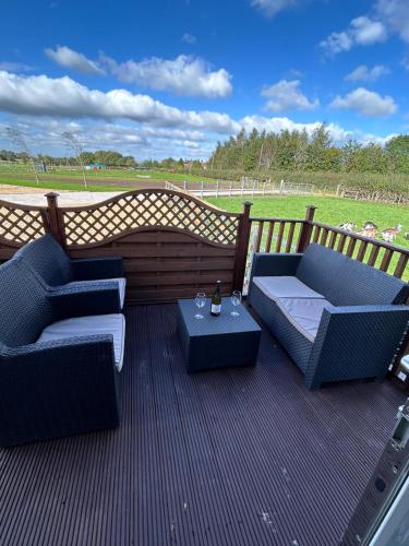 Ein Sitzbereich in der Unterkunft The Lodge