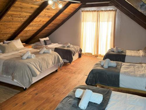 Postel nebo postele na pokoji v ubytování Tula Guest Farm