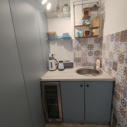 Una cocina o cocineta en Room Angel