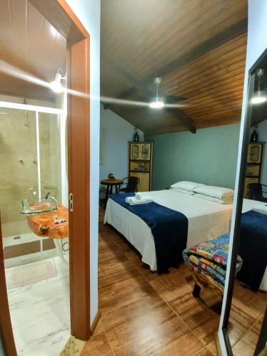 Una cama o camas en una habitación de Recanto Suíço