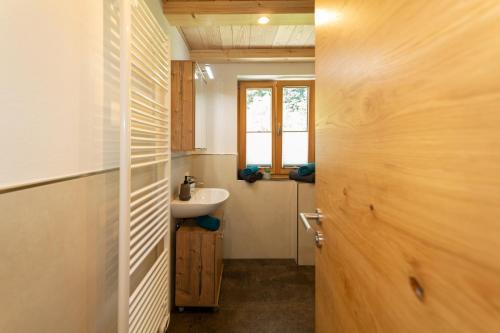 Et badeværelse på Kurzenwirt - Ferienwohnungen