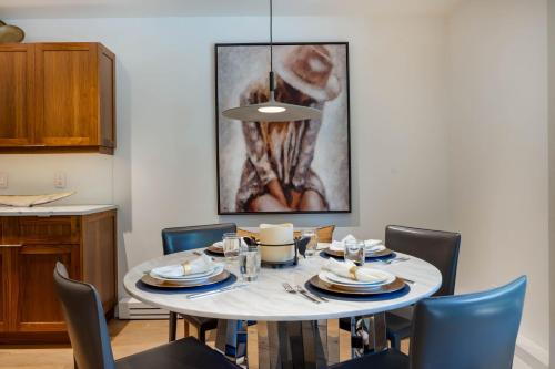 a dining room with a table and chairs at Luxurious 2 BR, 2 BA - Aspen Core in Aspen