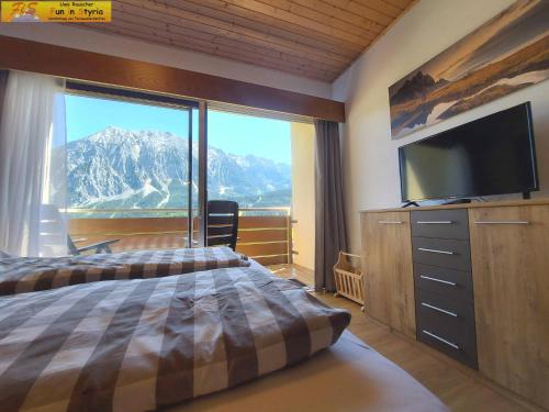 Postel nebo postele na pokoji v ubytování Apartment Salzkammergut