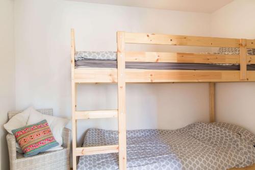 Katil atau katil-katil dalam bilik di Duinappartementen Schoorl