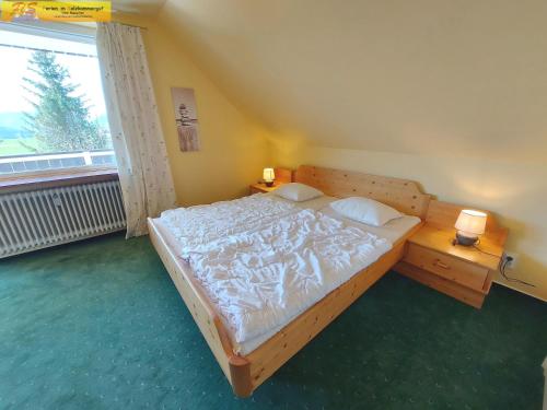 Ένα ή περισσότερα κρεβάτια σε δωμάτιο στο Apartment Alpenrock