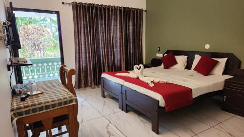 Postel nebo postele na pokoji v ubytování Divine Bliss Beach Resort