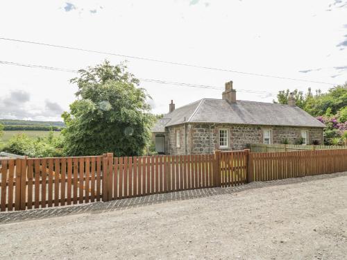 a wooden fence in front of a house at North Firbank - Culzean Castle in Maybole