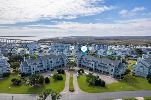 an aerial view of a city with houses and a clock at PCBV325 Anchor's Away in Manteo