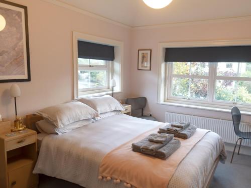 Postel nebo postele na pokoji v ubytování Wildwood B&B