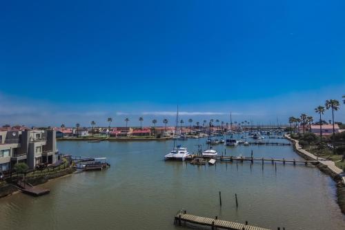 a group of boats docked in a harbor at Harbour Lights in Velddrif