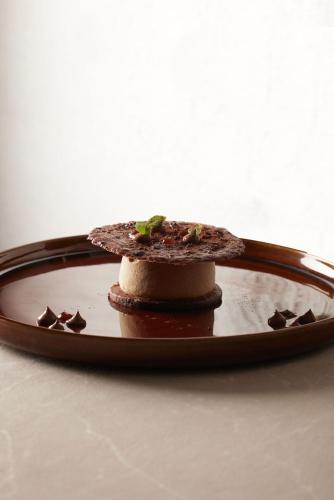 a plate with a dessert on top of it at L'Auberge du Brand in Turckheim