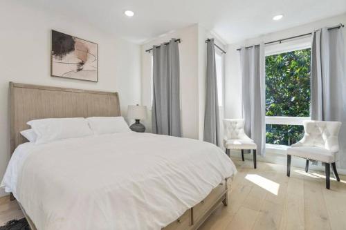 Ένα ή περισσότερα κρεβάτια σε δωμάτιο στο Townhouse at Capitol Hill 4 with Rooftop