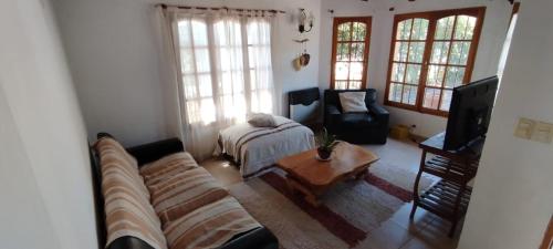 Χώρος καθιστικού στο Casa Oro y miel