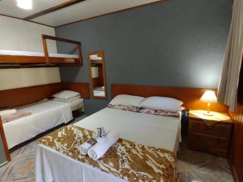 Una cama o camas en una habitación de Recanto Suíço