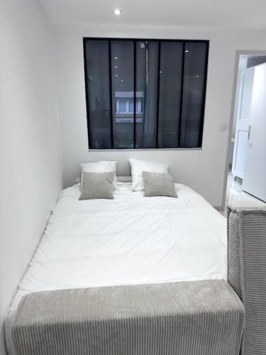 Postel nebo postele na pokoji v ubytování Appartement en Hyper centre
