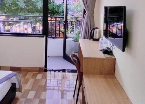 Lisa homestay 2にあるテレビまたはエンターテインメントセンター