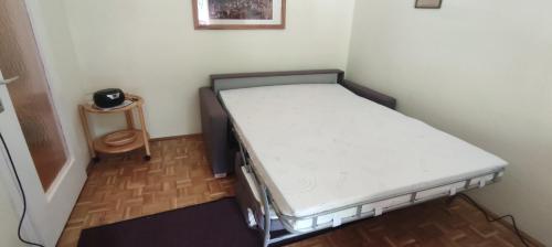 Postel nebo postele na pokoji v ubytování Alpenappartements Domicil include Jokercard
