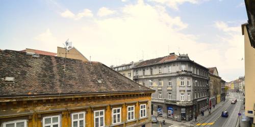 a view of a city with buildings and a street at Virtus Apartments and Rooms with Free Private Parking in Zagreb