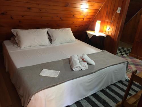Una cama o camas en una habitación de Recanto Suíço