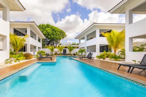 an image of a swimming pool in a villa at The Sunset - Luxurious Penthouse near Jan Thiel Beach in Jan Thiel