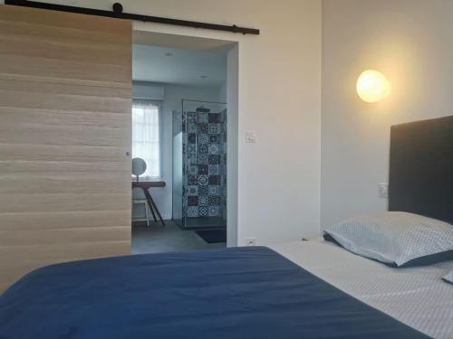 Posteľ alebo postele v izbe v ubytovaní Rhun Izella - Maison avec vue exceptionnelle - Jacuzzi et Sauna face à la mer