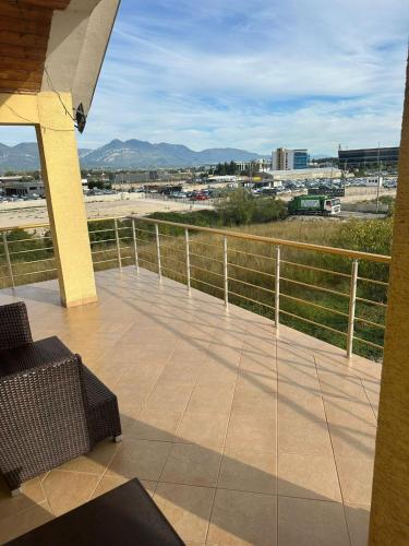 a balcony with a view of a city at Karaj Apartments in Tirana