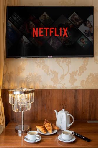 Televisyen dan/atau pusat hiburan di David Boutique Hotel