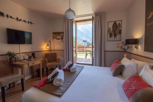 Katil atau katil-katil dalam bilik di Chalet Hôtel La Sapinière