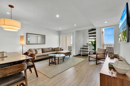 a living room with a couch and a table at Bahia Mar Solare Beachfront Resort Condos with Two Pools in South Padre Island