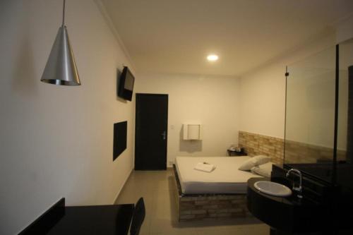 Ένα ή περισσότερα κρεβάτια σε δωμάτιο στο Hotel Romance (Adults Only)
