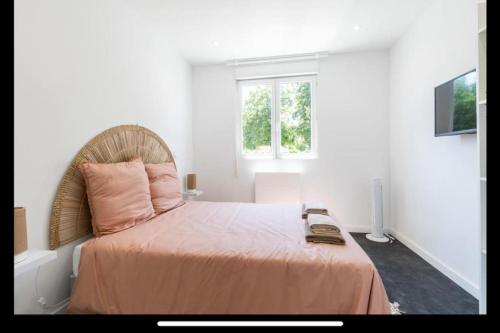 Ένα ή περισσότερα κρεβάτια σε δωμάτιο στο Maison à deux pas du port