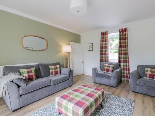 a living room with two couches and two chairs at Garden House - Culzean Castle in Maybole