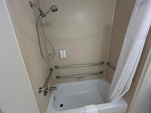 a shower stall in a bathroom with a toilet at Sleep Inn & Suites Manchester near Arnold AFB in Manchester