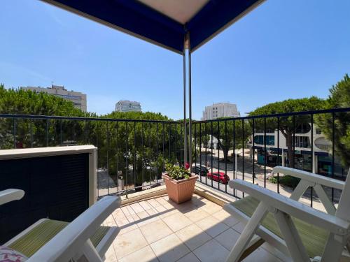 En balkon eller terrasse på Grand appartement mer et commerces à pied