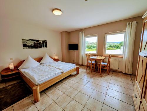 Postel nebo postele na pokoji v ubytování Weingut Weich