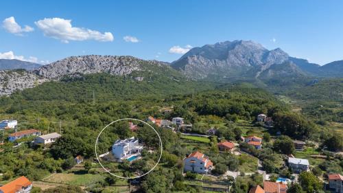 an aerial view of a house in the mountains at New!Villa Giro in Slime