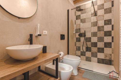 Ванная комната в CALLE DE BERNARDIS 2 l BB APARTMENTS TRIESTE